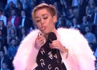 Miley Smokes Joint on Stage in Amsterdam